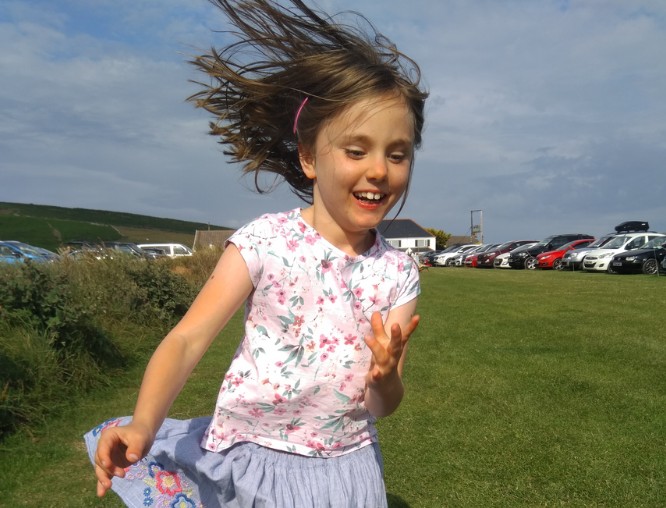 Kya bouncing happily on her gym ball