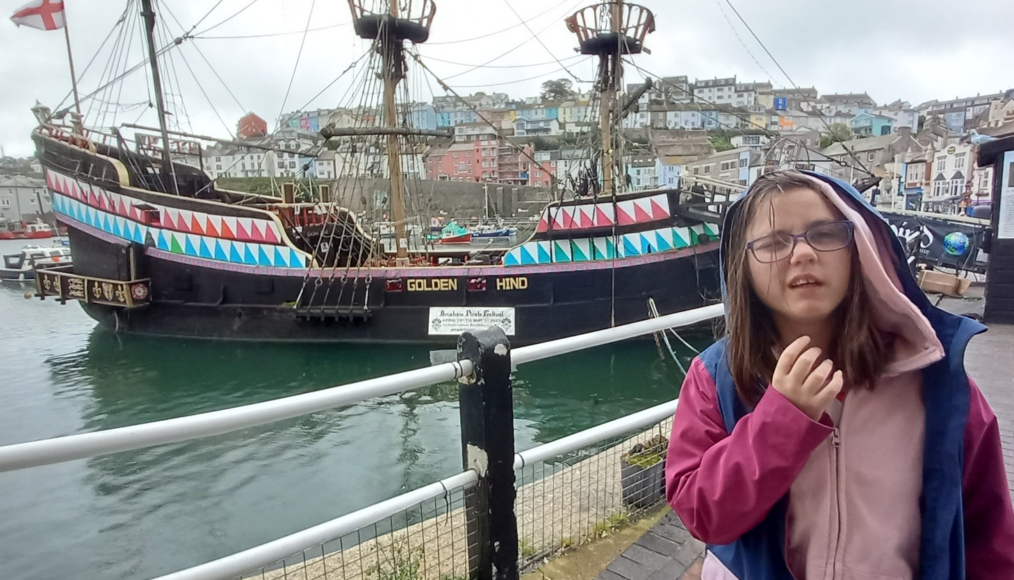 Kya on a family trip, looking out at the view