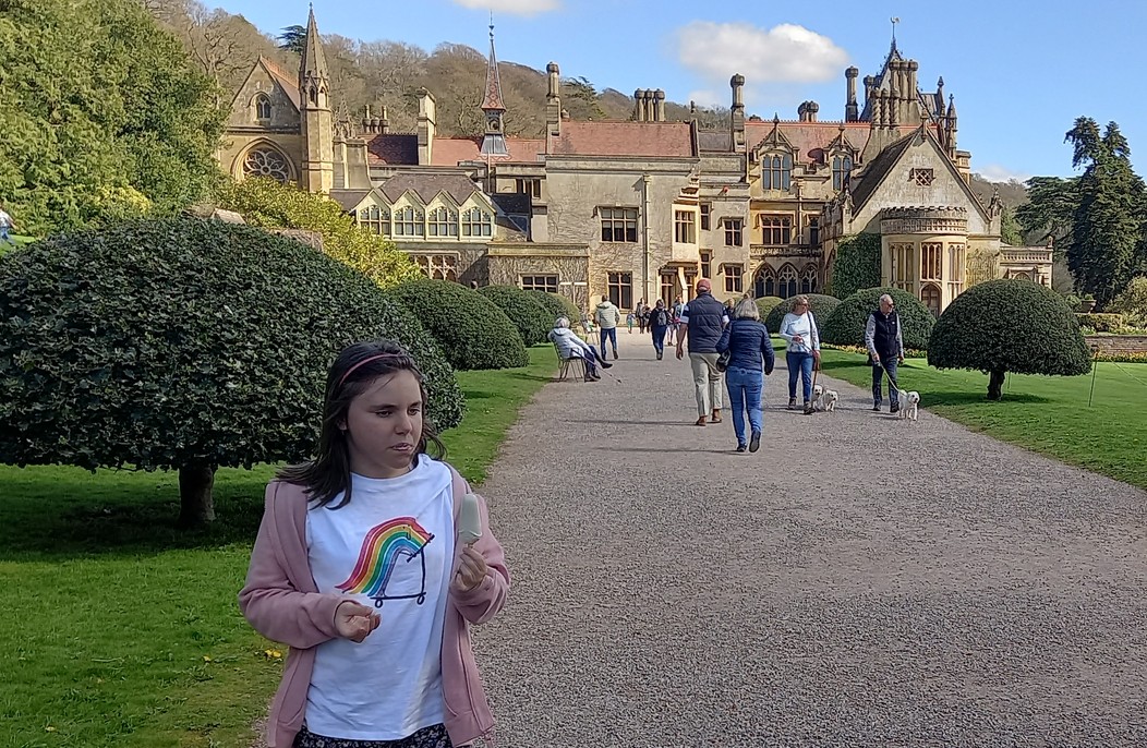 Kya exploring a grand National Trust staircase